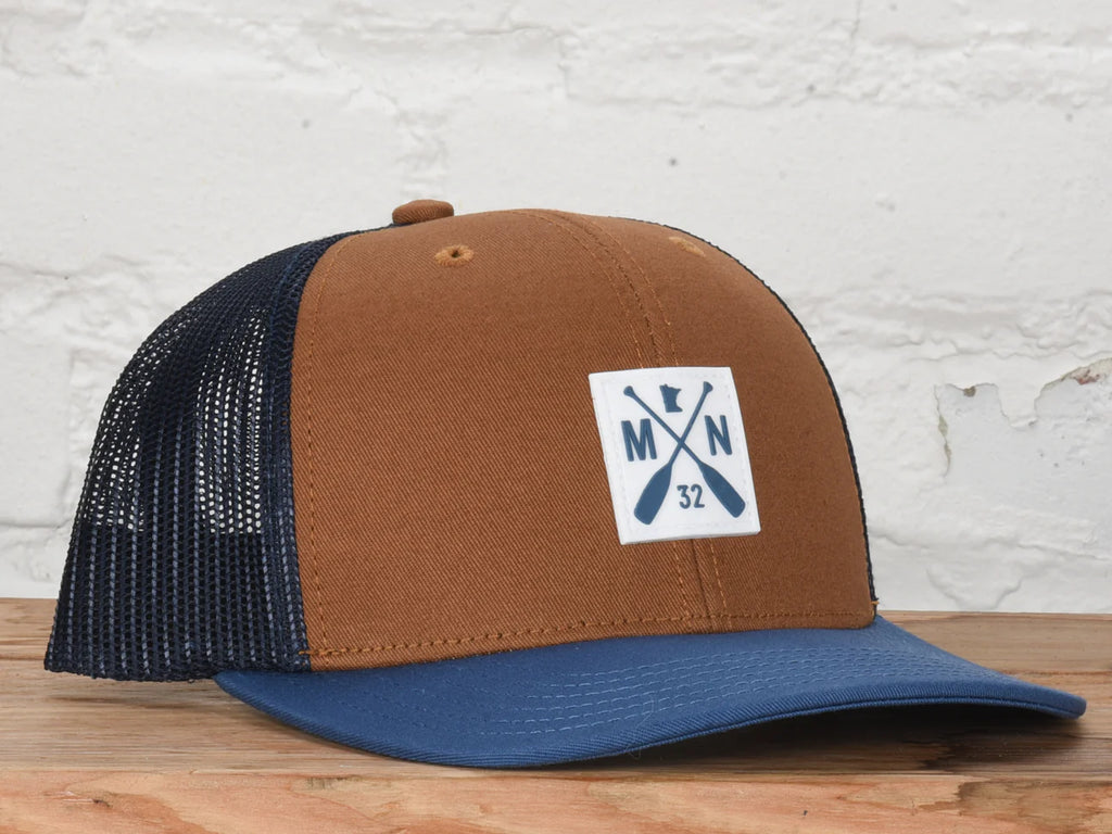 brown and blue snapback hat