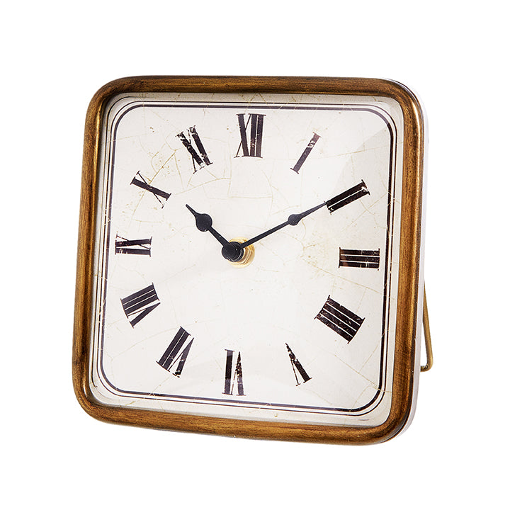 gold square tabletop clock with roman numeral numbers