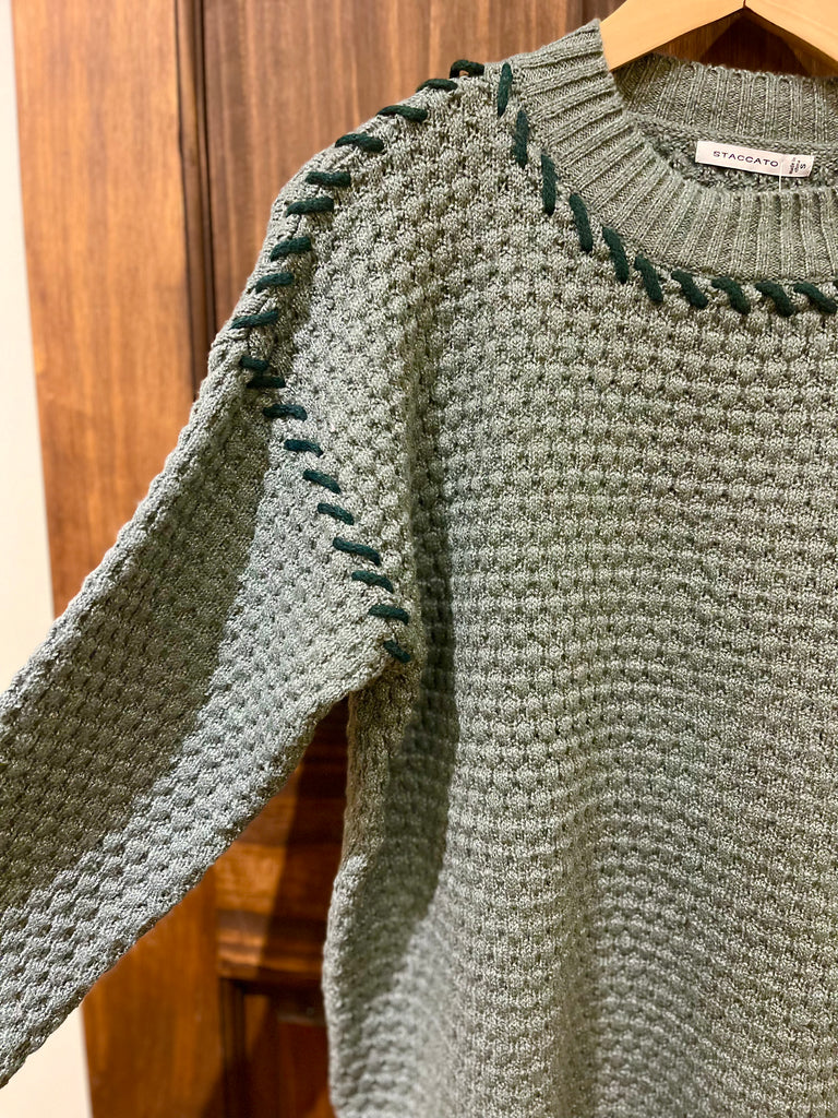 green waffle sweater with whip stitch detail
