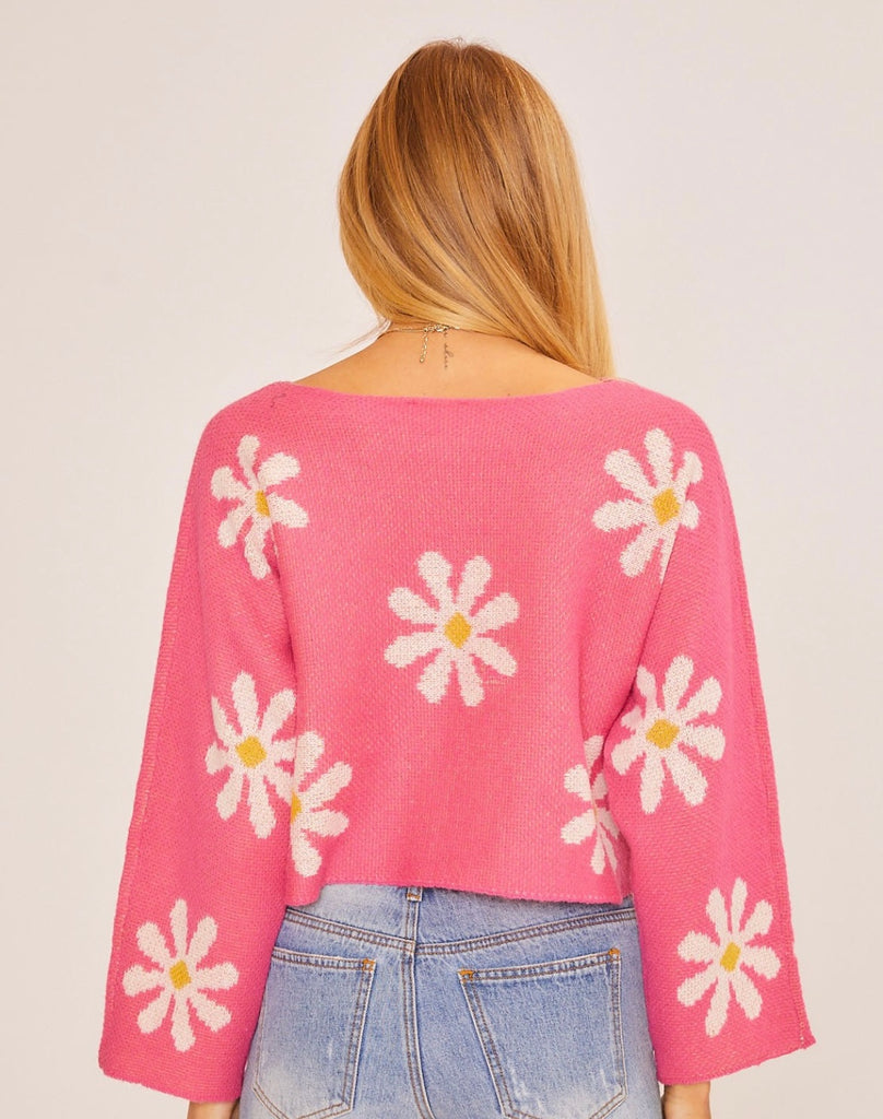 pink sweater with white daisy flowers