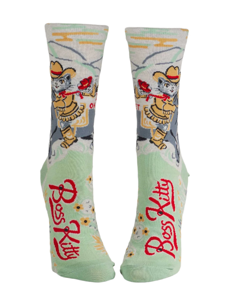 a pair of socks that say boss kitty on them