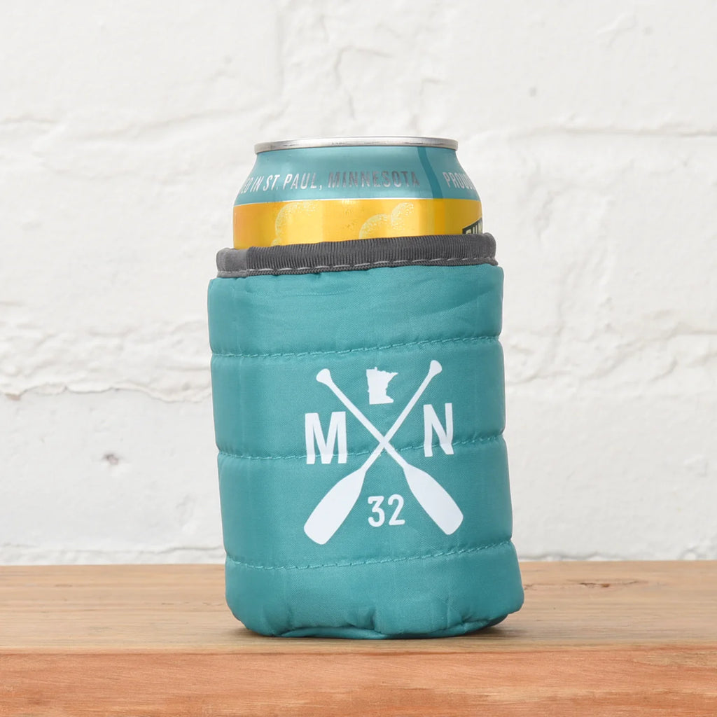 teal can coozie made to look like a sleeping bag.  oars, minnesota shape and letters M, N on it 