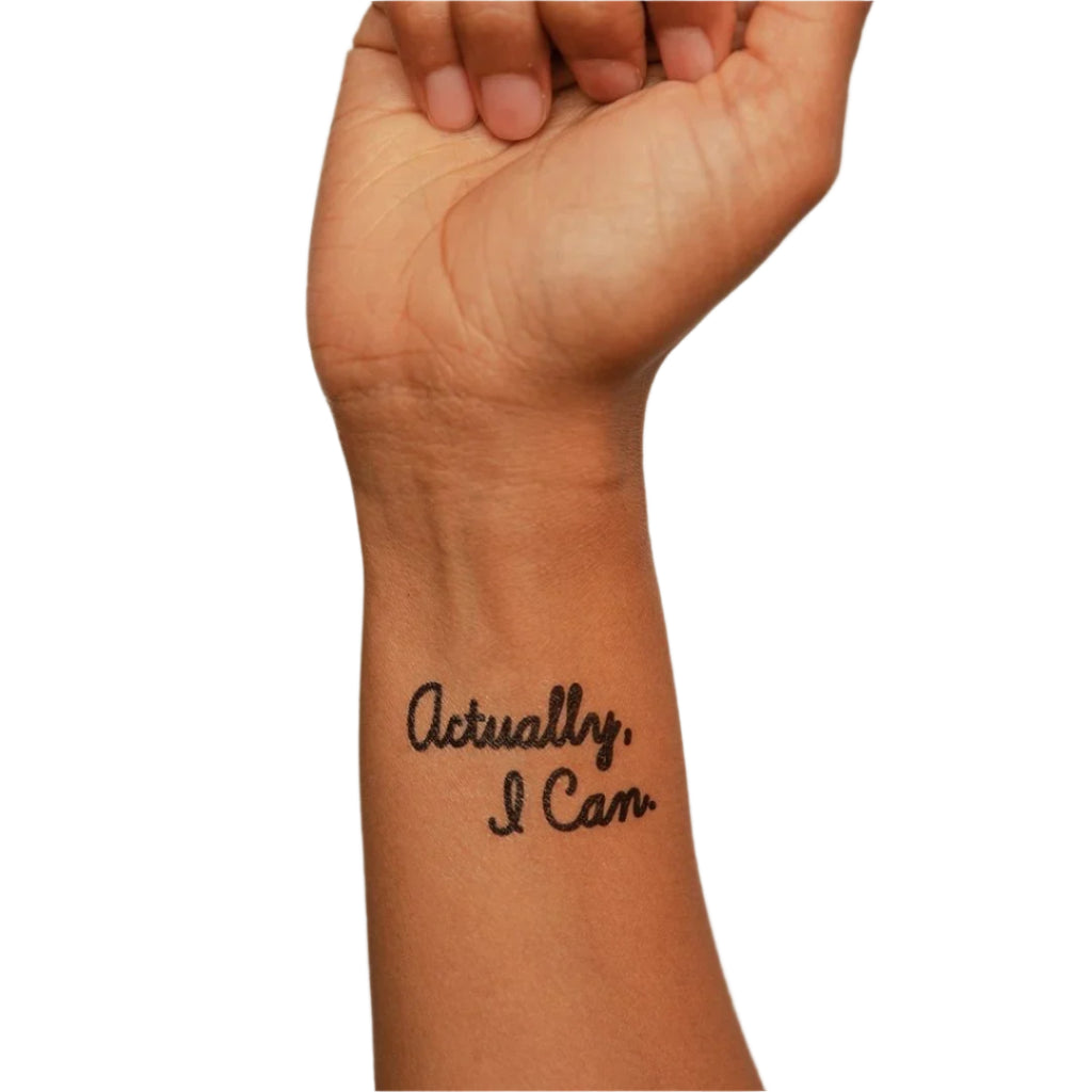 a person has a tattoo on their wrist that says actually i can