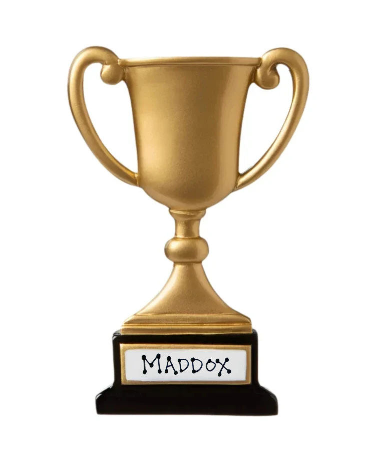 a gold trophy with the name maddox on it